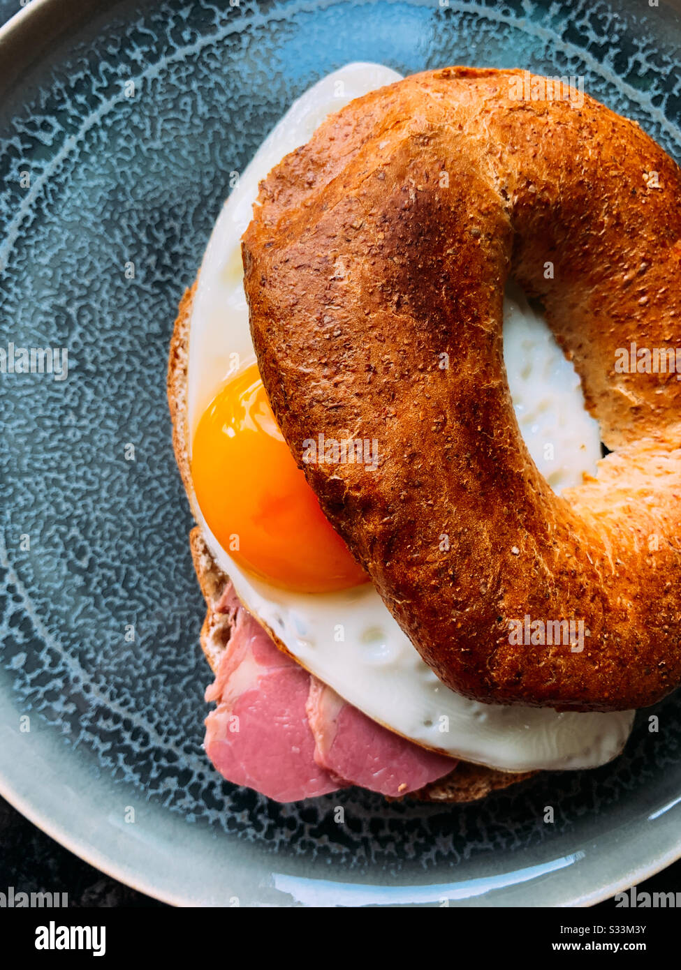 Toasted egg and beef wholemeal bagel - Smartphone Captured Stock Image