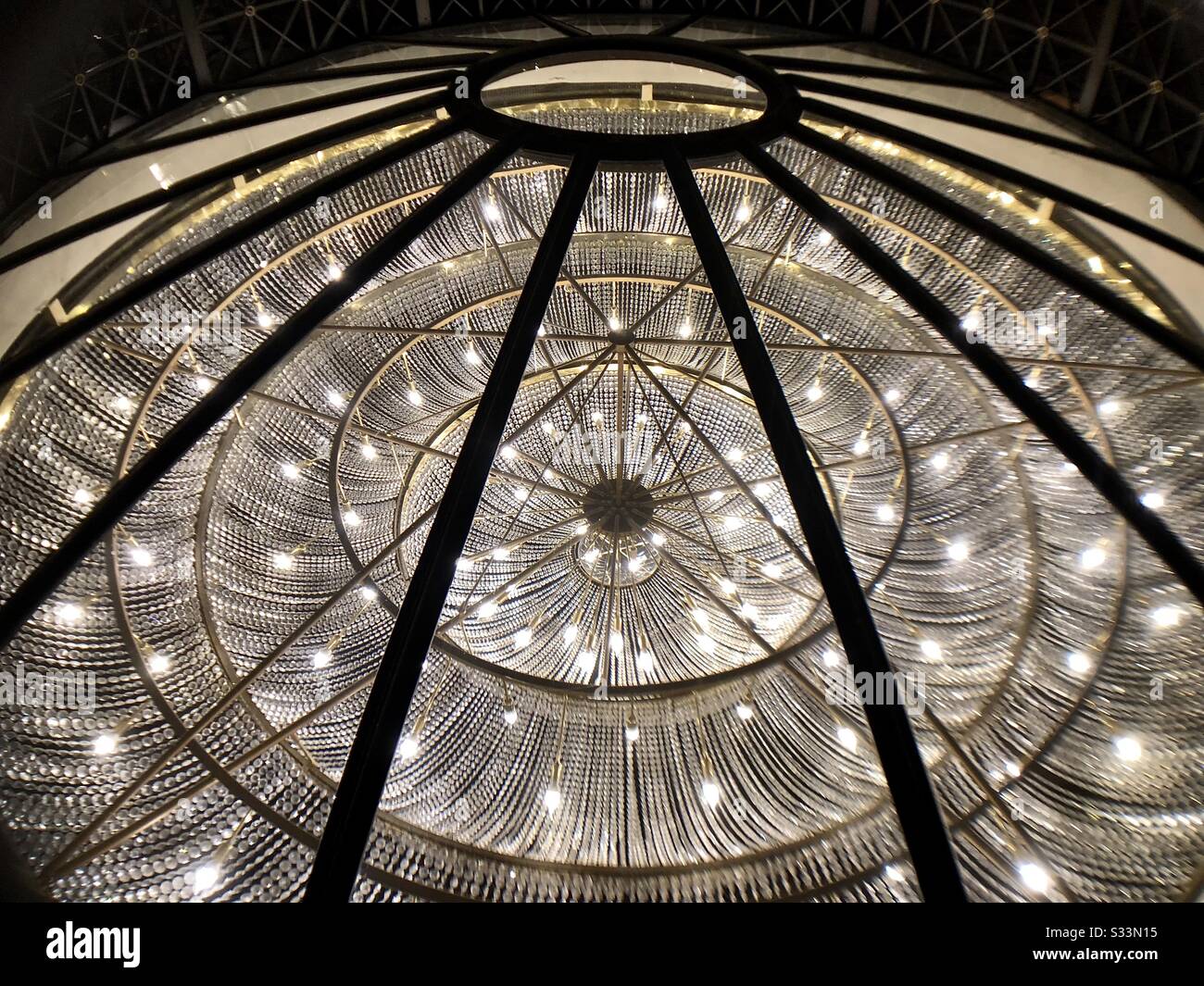 Interior dome of the floor below.  Geometric, circular, with radiating lines. Stock Photo