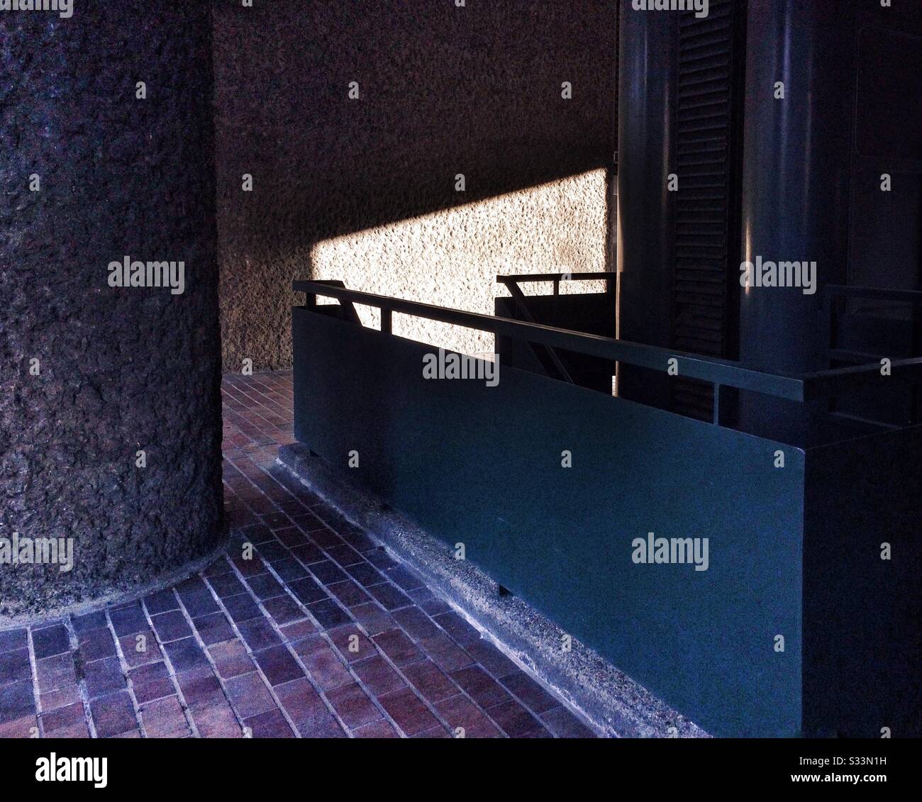 Light and shadow play on an architectural detail in the Barbican Centre, London, UK - Smartphone Captured Stock Image