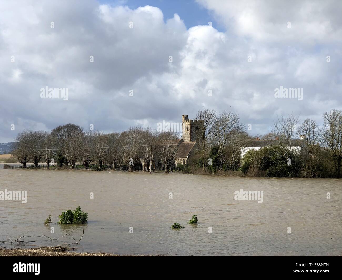 The flooded church at Severn Stoke Gloucestershire after Storm Dennis Stock Photo