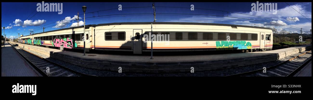 Train at the platform of Ascó station, Catalonia, Spain. - Smartphone Captured Stock Image