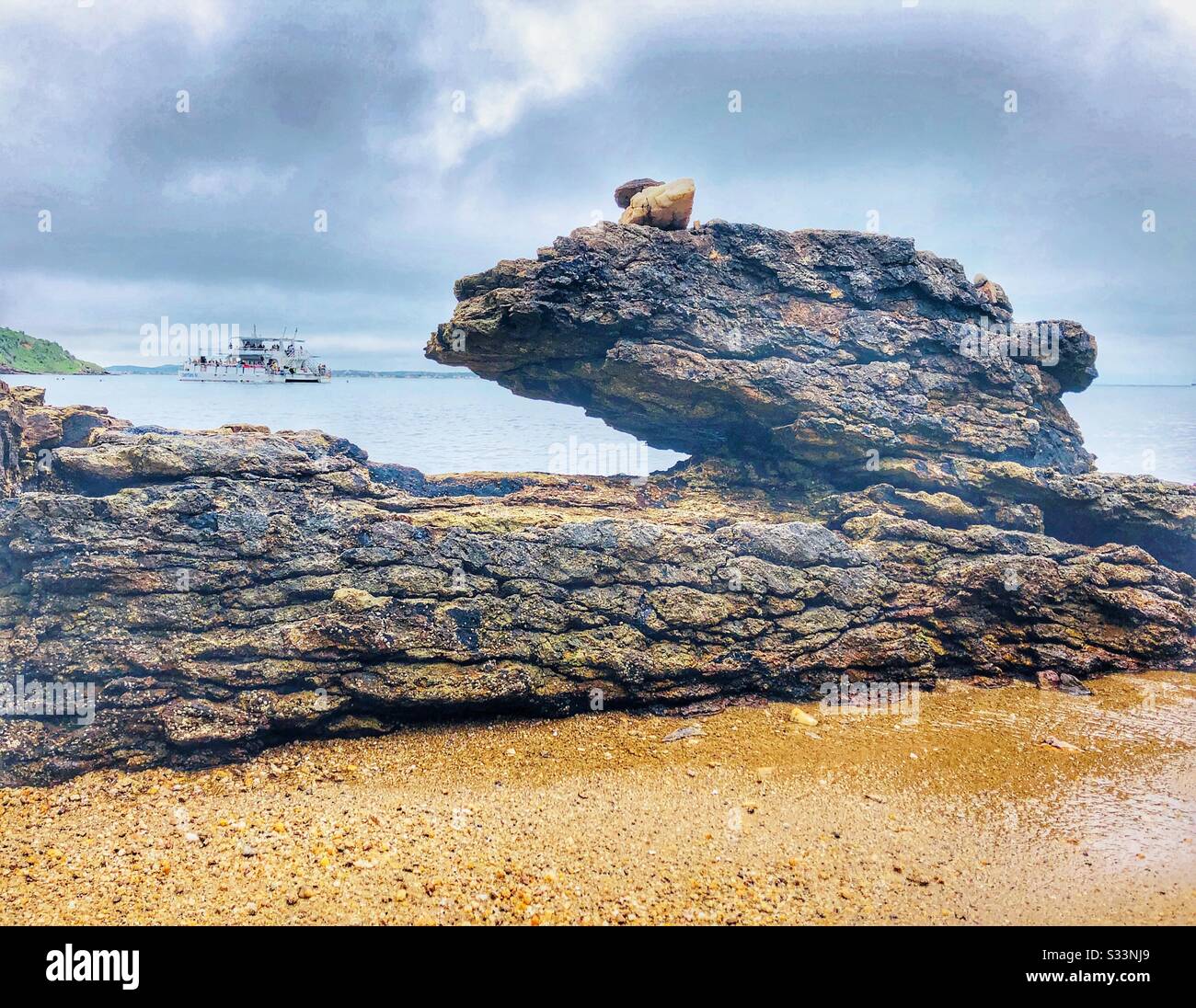 Rock formations on Tartaruga beach in Buzios, Brazil. Stock Photo