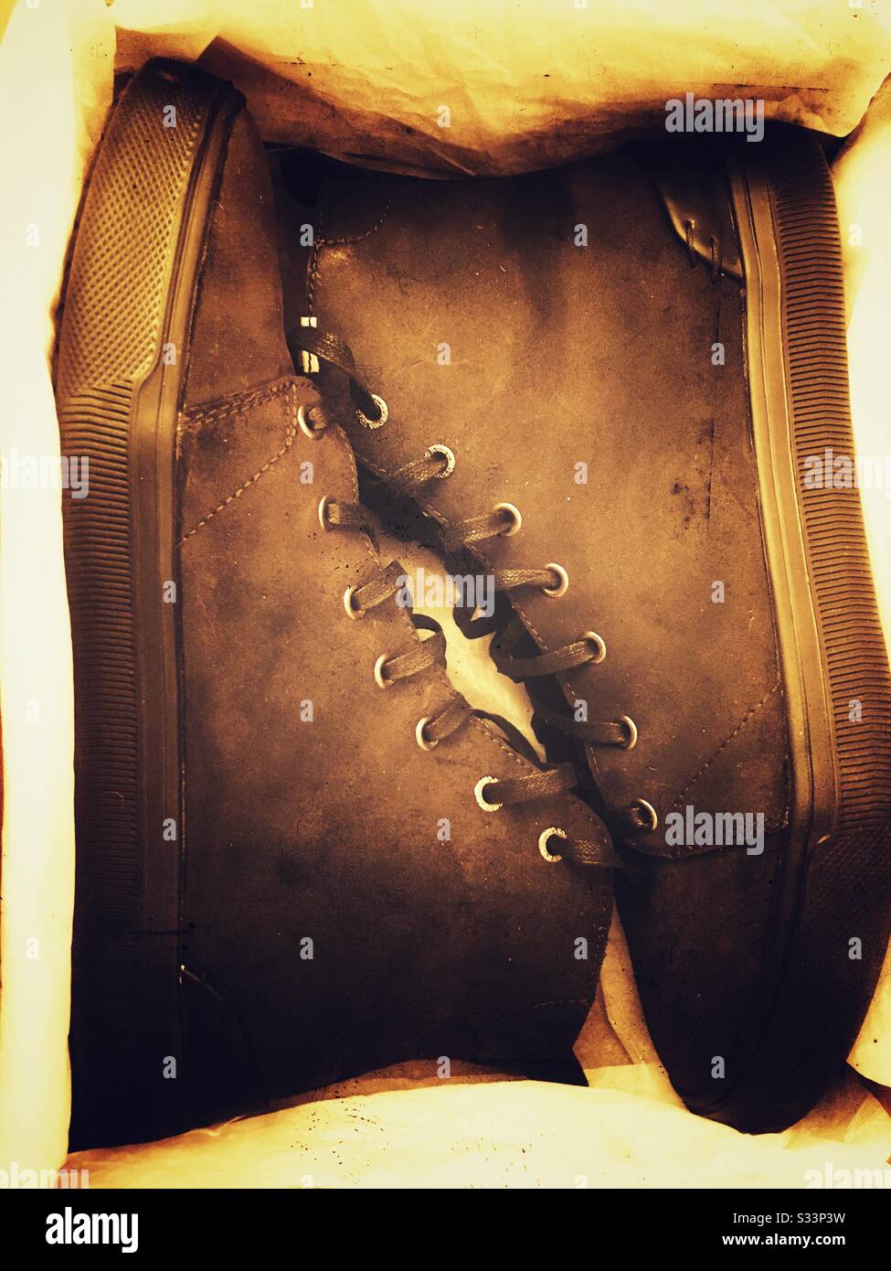 Toms men’s boots - Smartphone Captured Stock Image