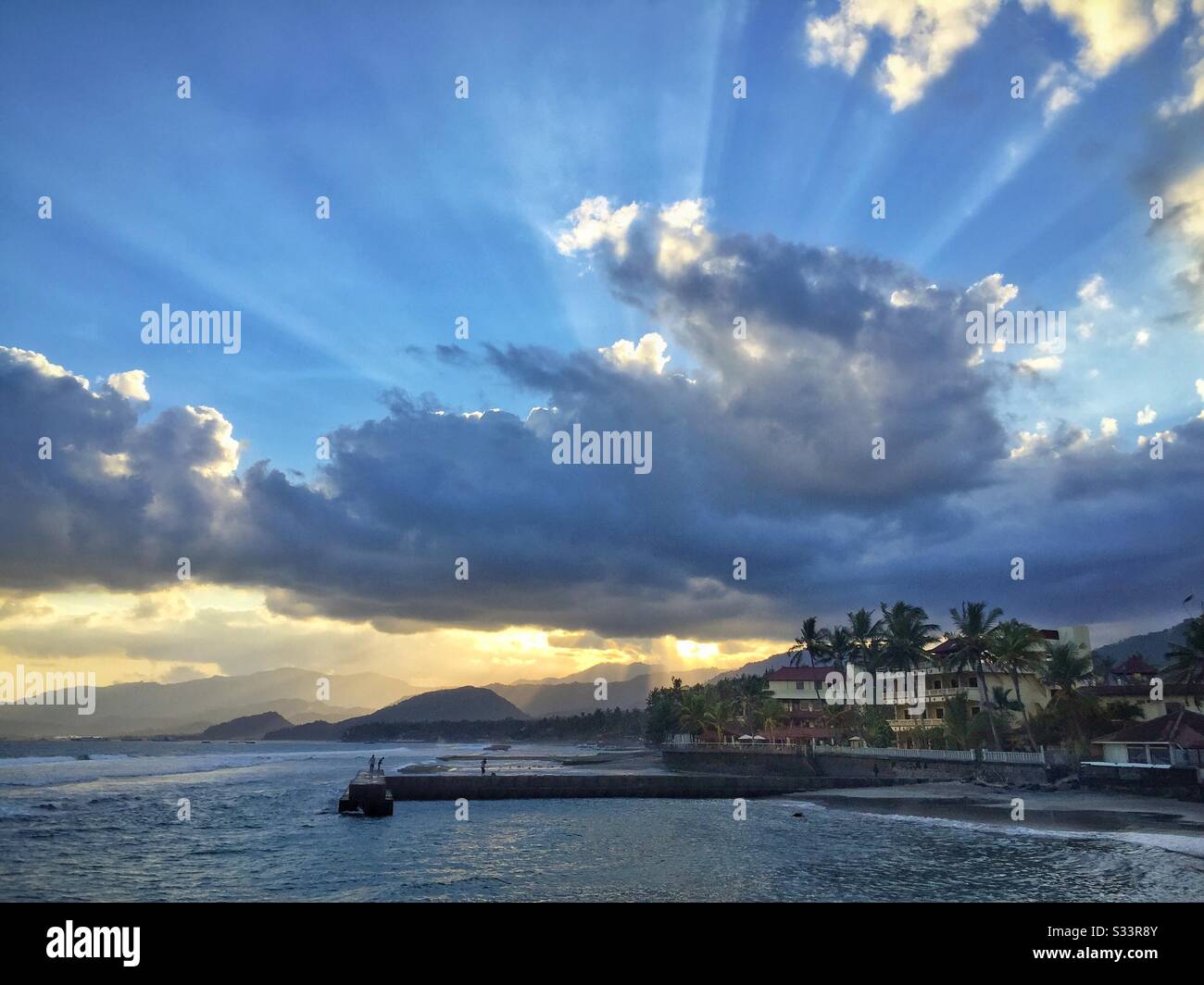 Sunset at Bali Palms Resort, Candidasa, Bali, Indonesia - Smartphone Captured Stock Image