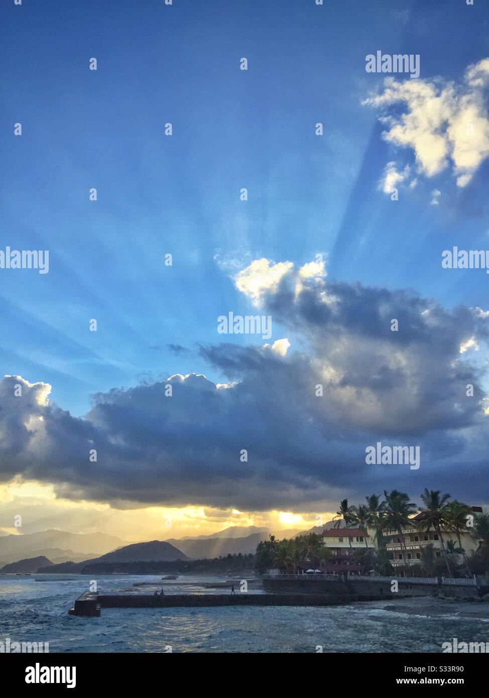 Sunset at Bali Palms Resort, Candidasa, Bali, Indonesia - Smartphone Captured Stock Image