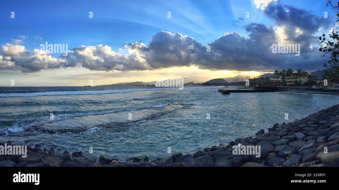 Sunset at Bali Palms Resort, Candidasa, Bali, Indonesia - Smartphone Captured Stock Image
