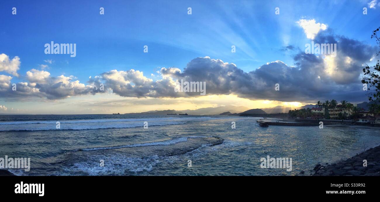 Sunset at Bali Palms Resort, Candidasa, Bali, Indonesia - Smartphone Captured Stock Image