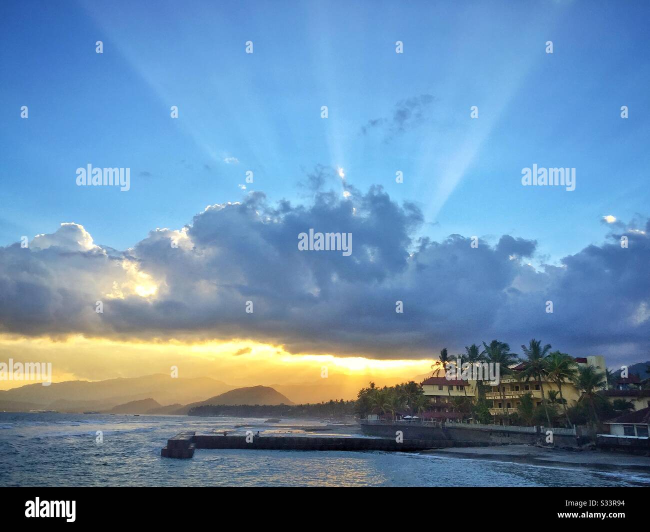 Sunset at Bali Palms Resort, Candidasa, Bali, Indonesia - Smartphone Captured Stock Image