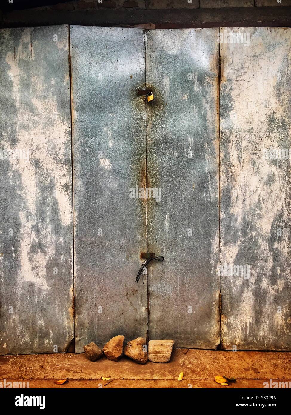 Metal door, Candidasa, Bali, Indonesia - Smartphone Captured Stock Image
