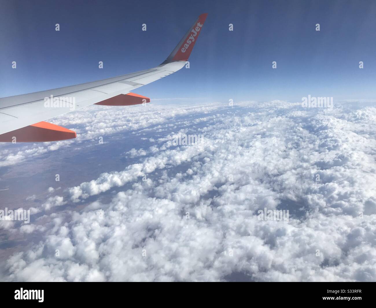 Striped clouds over Spain. Stock Photo