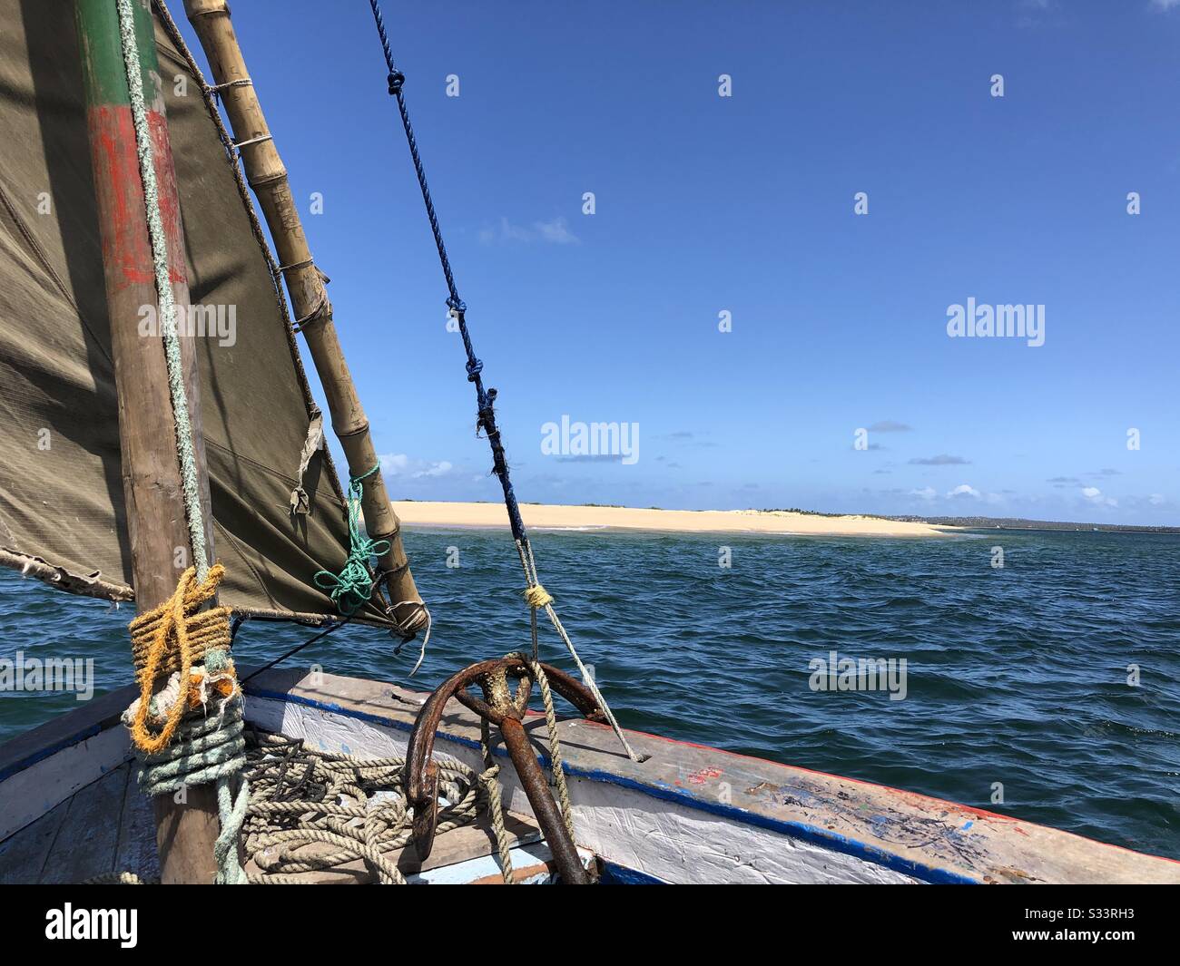 Dhow sailing to island - Smartphone Captured Stock Image