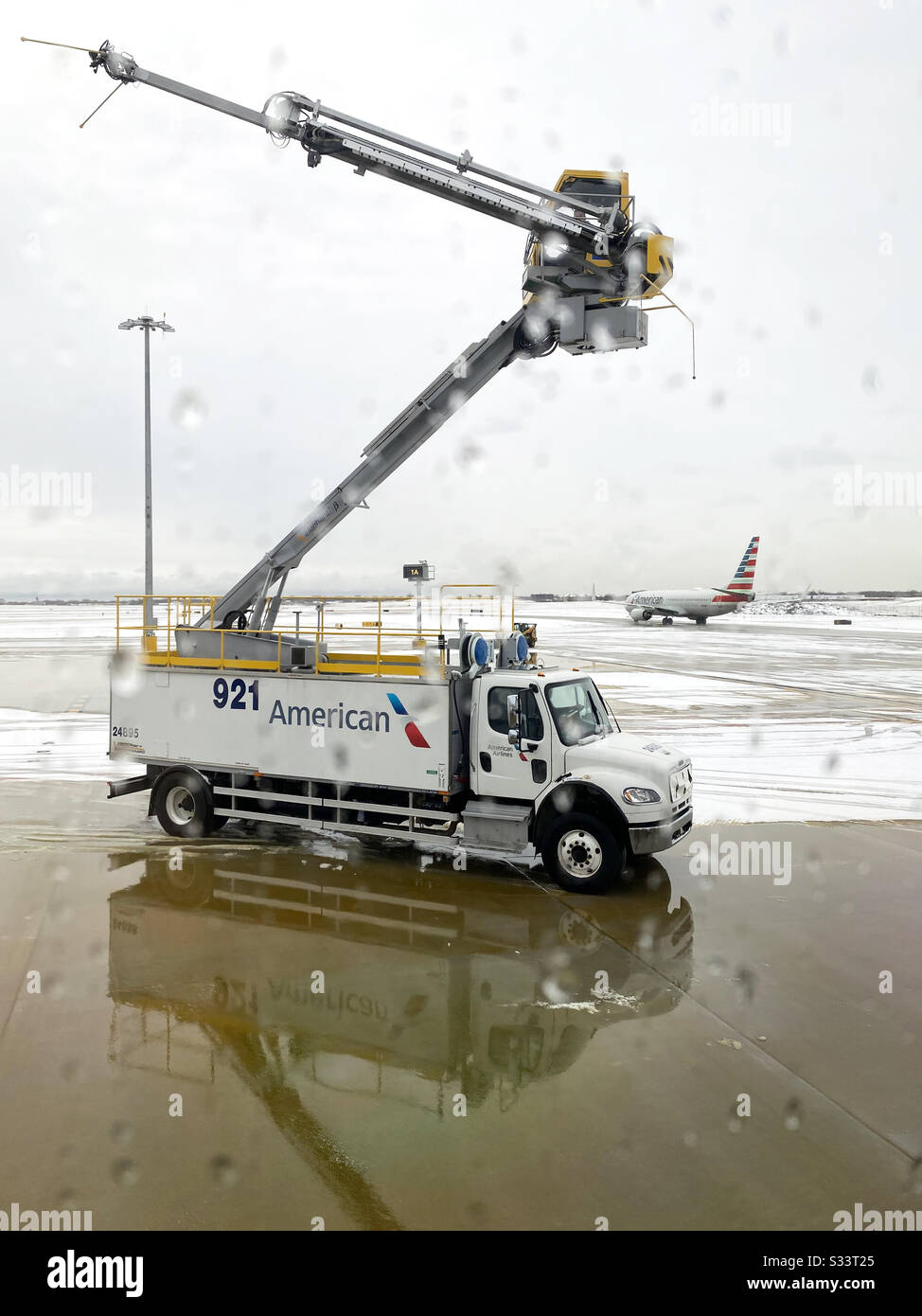 American Airlines deicing truck. Stock Photo