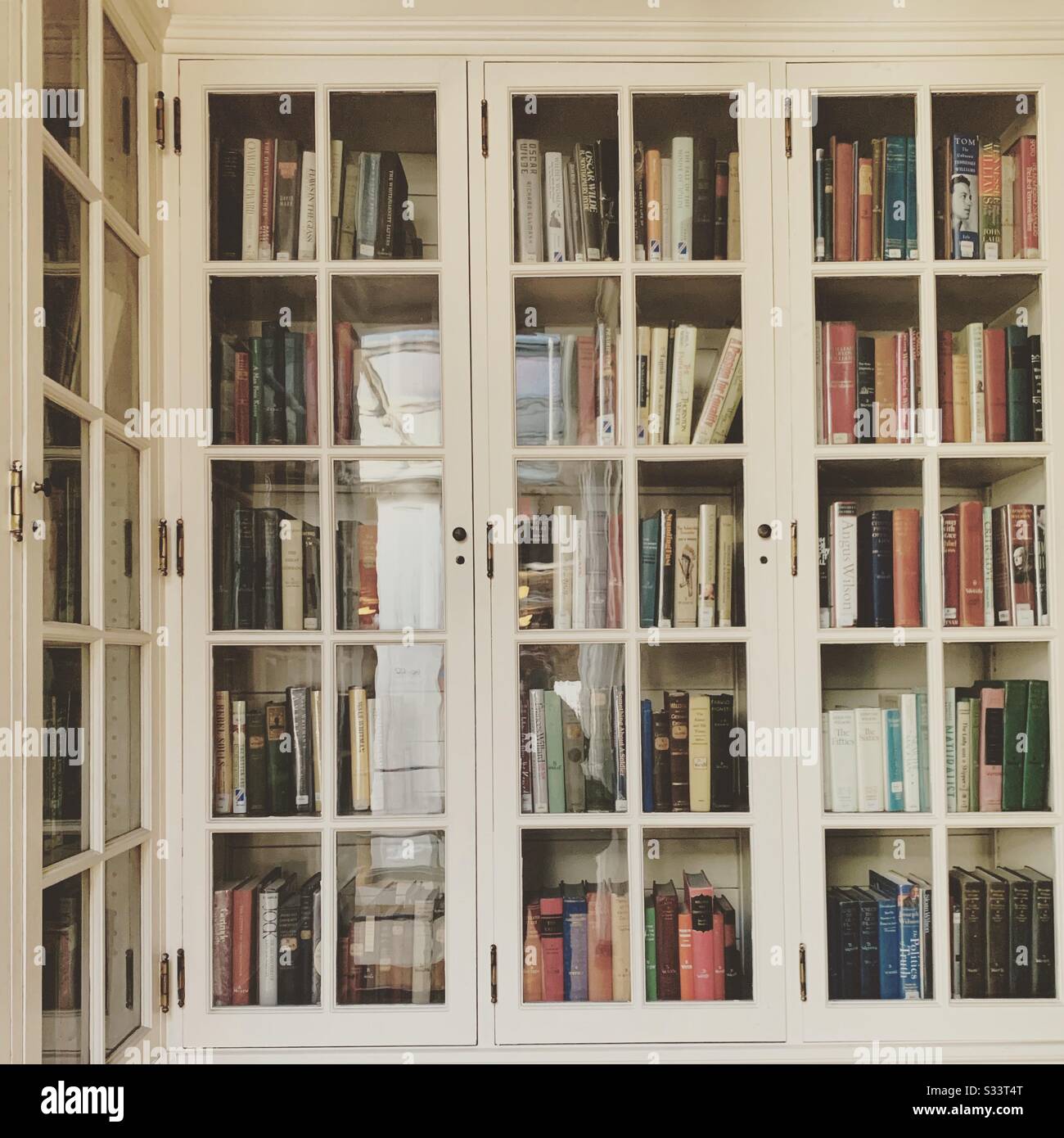Books in cabinets at the Providence Athenaeum, Providence, Rhode Island, United States - Smartphone Captured Stock Image