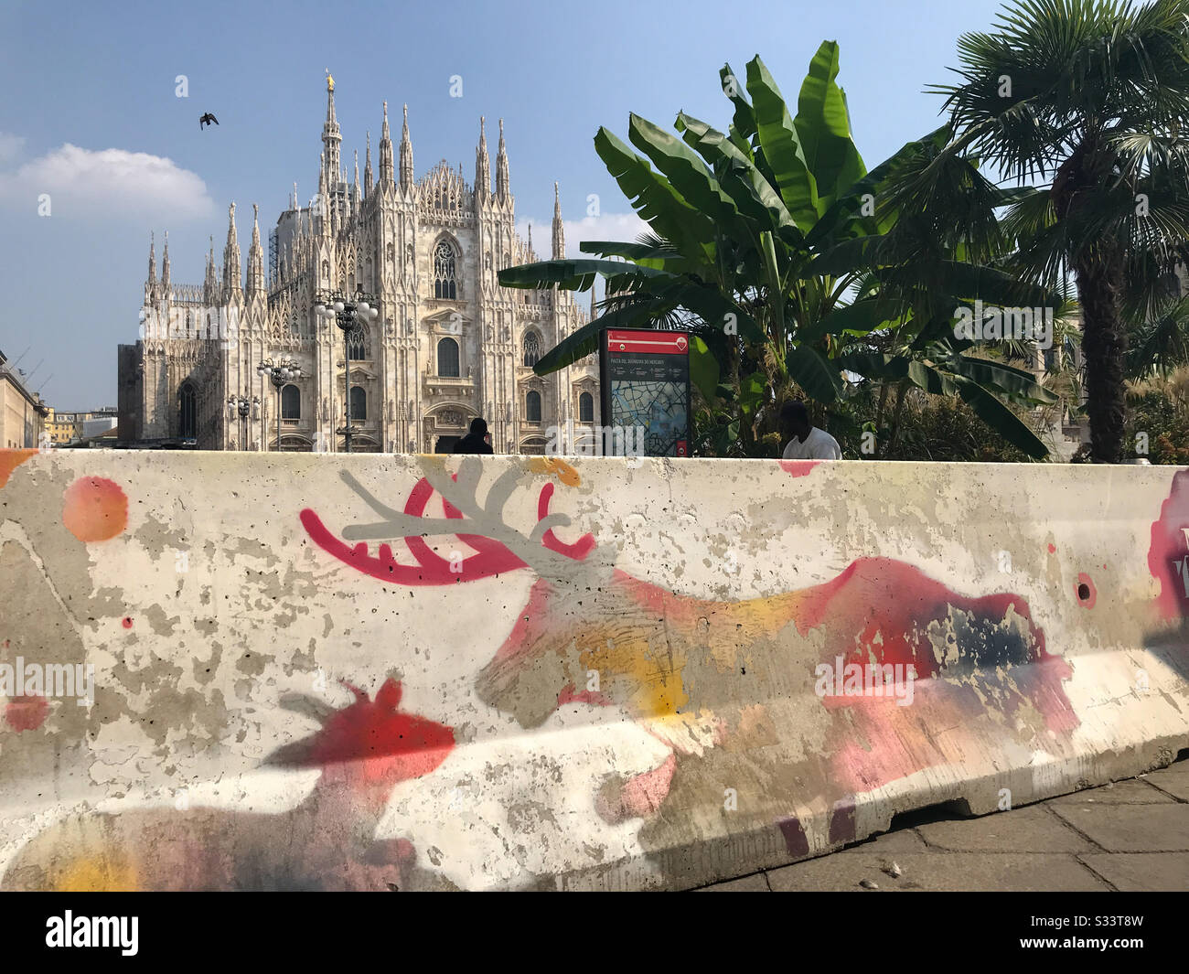 Artistically painted concrete curb in-front of the Duomo in Italy. Stock Photo