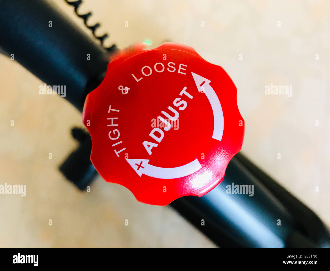 Spinning bike adjust and brake red knob. Healthy lifestile. Fitness, sport, training. - Smartphone Captured Stock Image