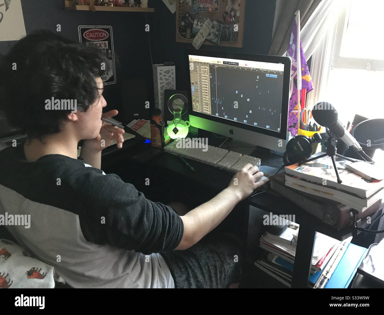 Music producer at work - Smartphone Captured Stock Image Music producer at work - Smartphone Captured Stock Image