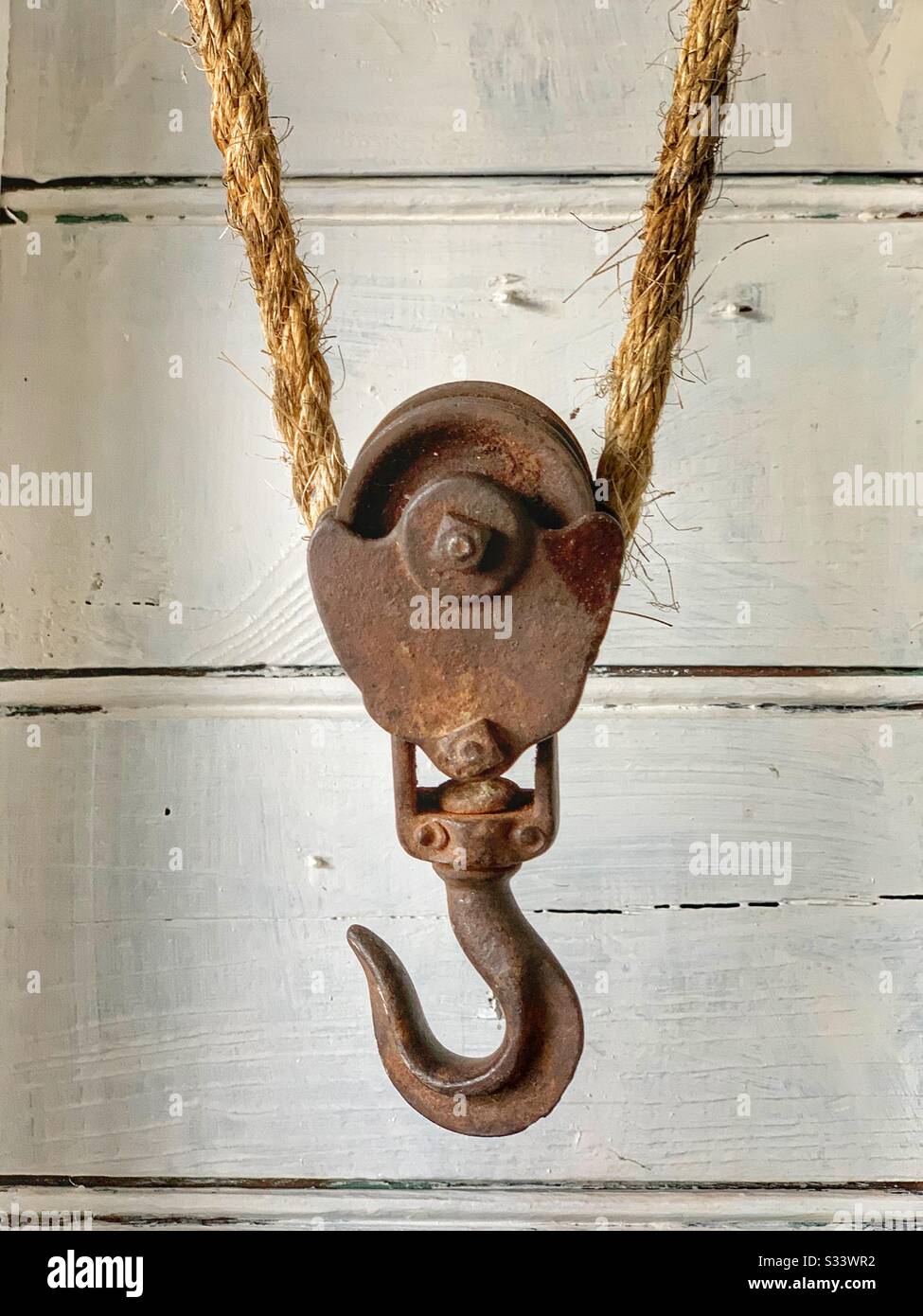 Vintage pulley  block and tackle hook Stock Photo