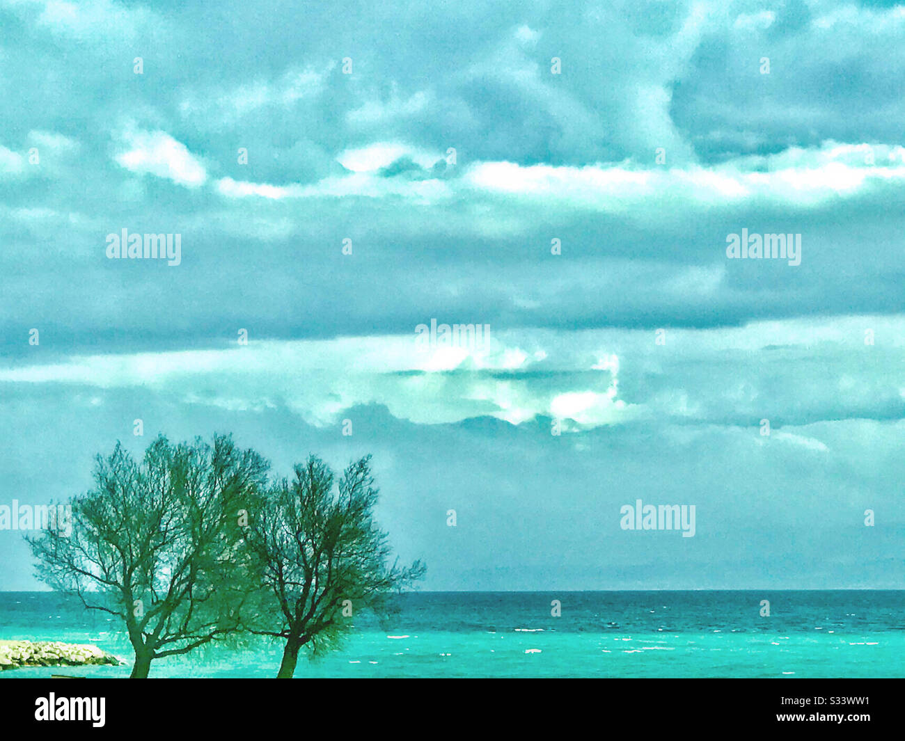 An empty beach in winter time at Znjan beach in Split, Croatia - Smartphone Captured Stock Image