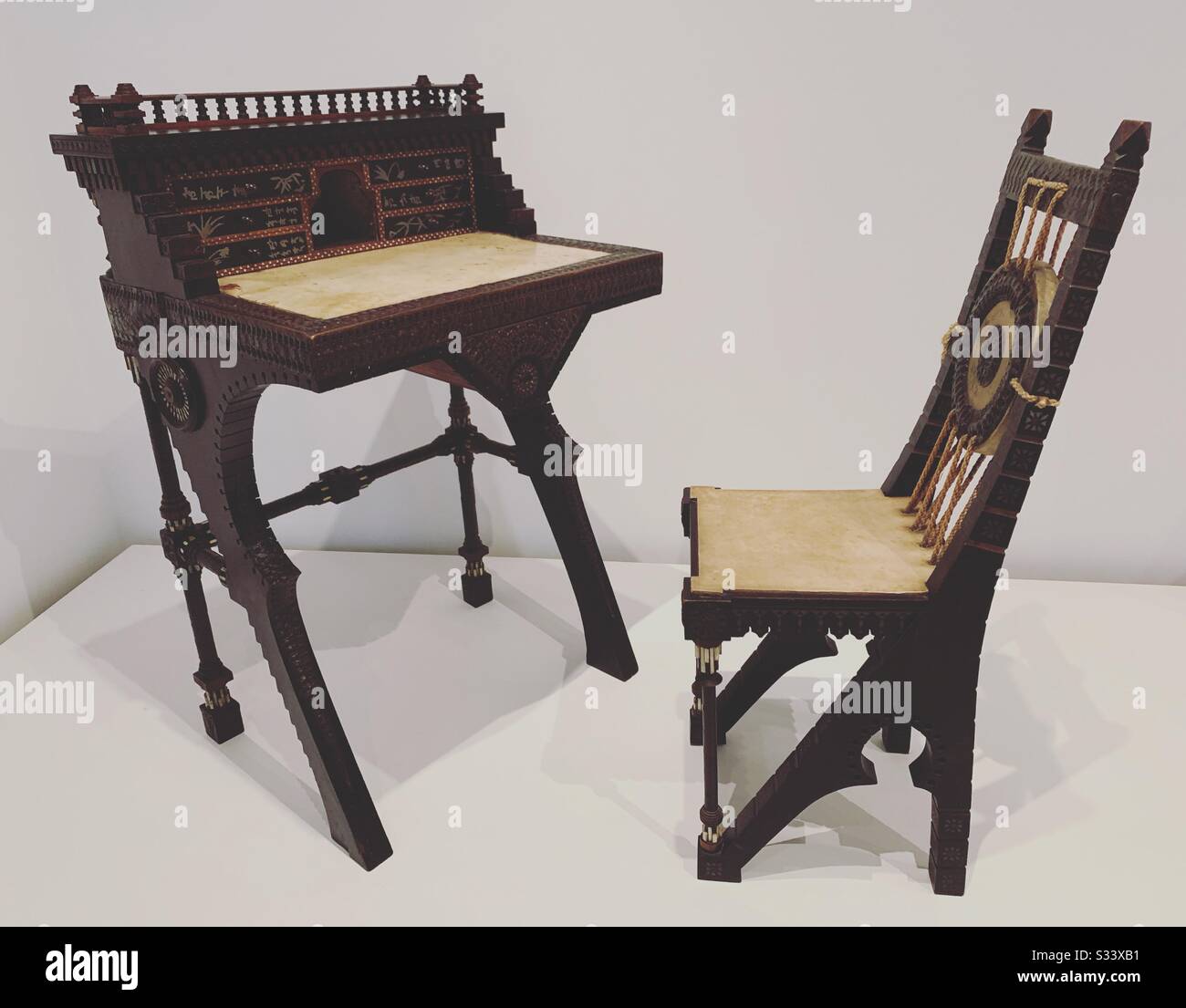 Desk and chair, ca 1900 by Carlo Bugatti, RISD Museum, Providence, Rhode Island, United States - Smartphone Captured Stock Image