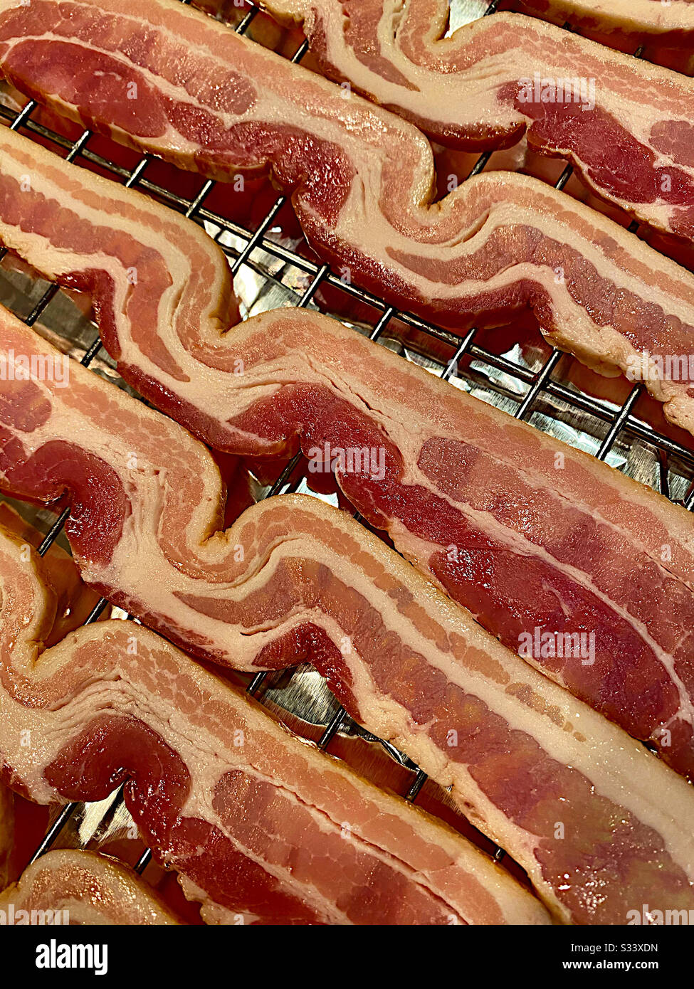 Strips of bacon, ready for cooking - Smartphone Captured Stock Image