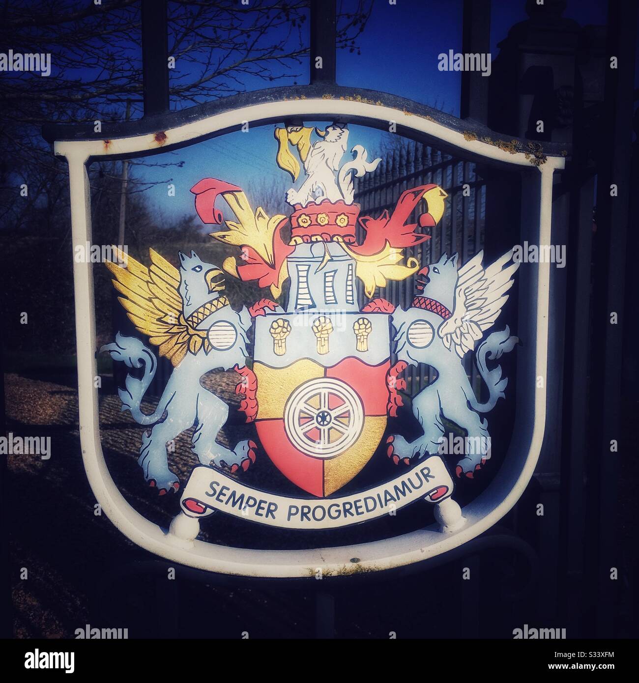 Coat of arms on Meadow Brook cemetery gate in Crewe Cheshire Uk - Smartphone Captured Stock Image