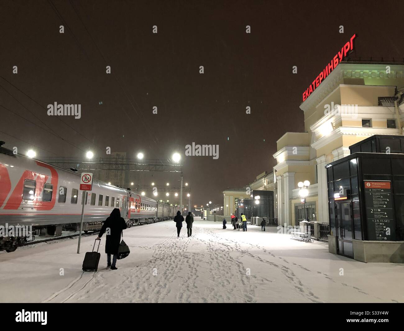 Ekaterinburg railway station platform in the winter snow - arriving on the Trans-Siberian train Stock Photo