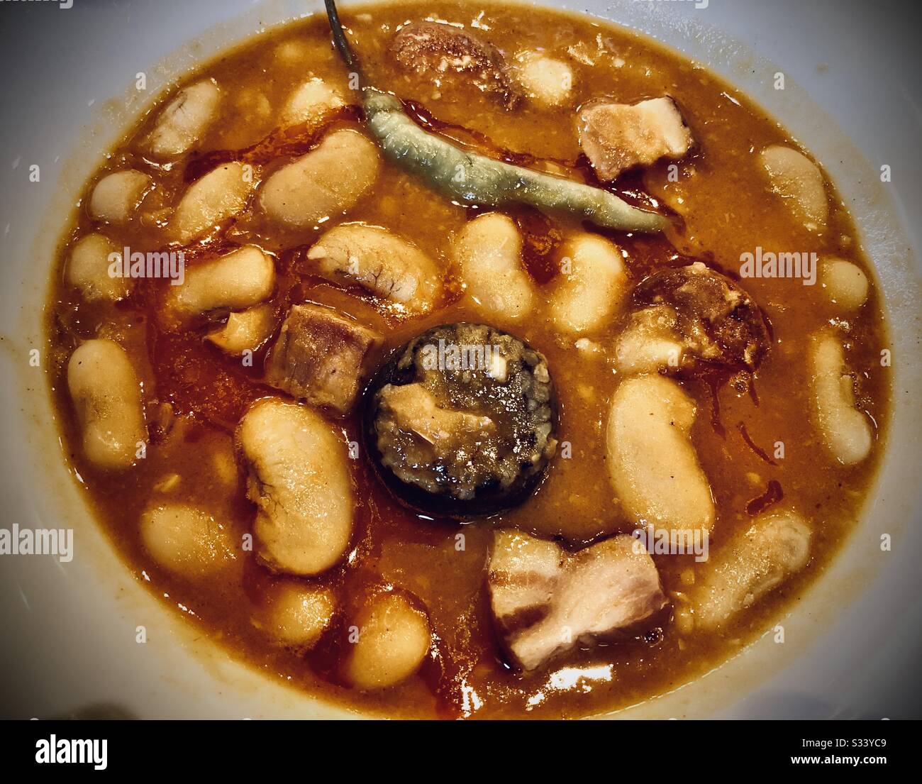 Bean stew with chorizo and morcilla blood sausage Stock Photo Alamy