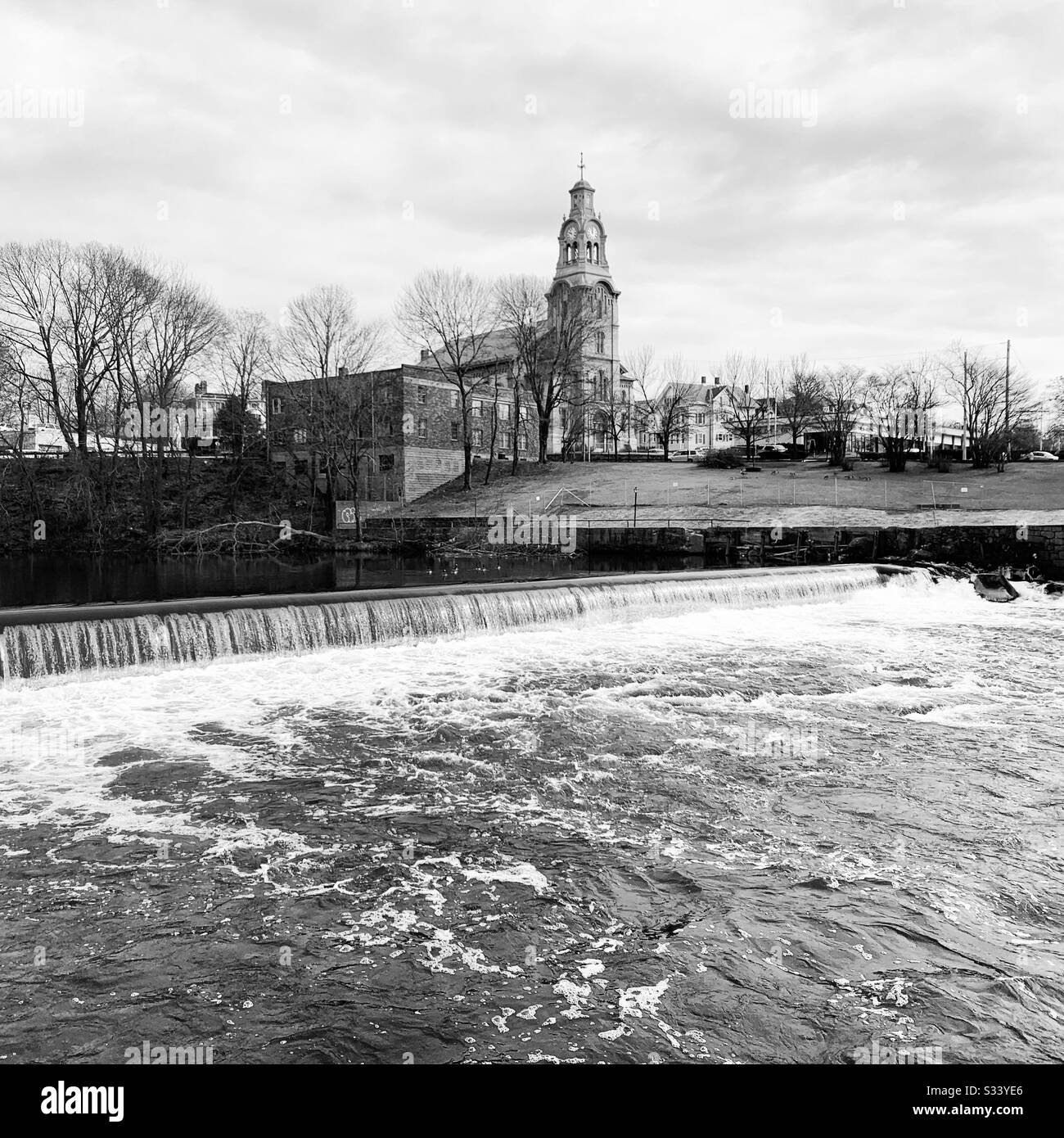 Black and white winter view from Old Slater Mill, Pawtucket, Rhode Island, United States - Smartphone Captured Stock Image