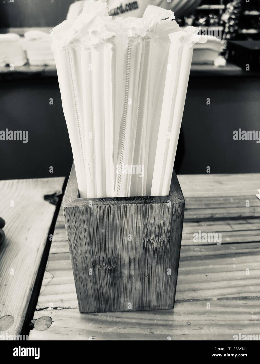 Wooden straws container at a diner Stock Photo Alamy
