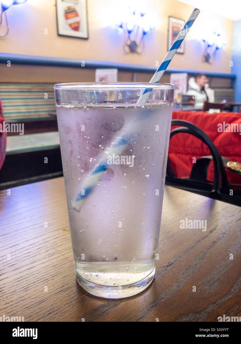 Glass of lemonade with a drinking straw - Smartphone Captured Stock Image