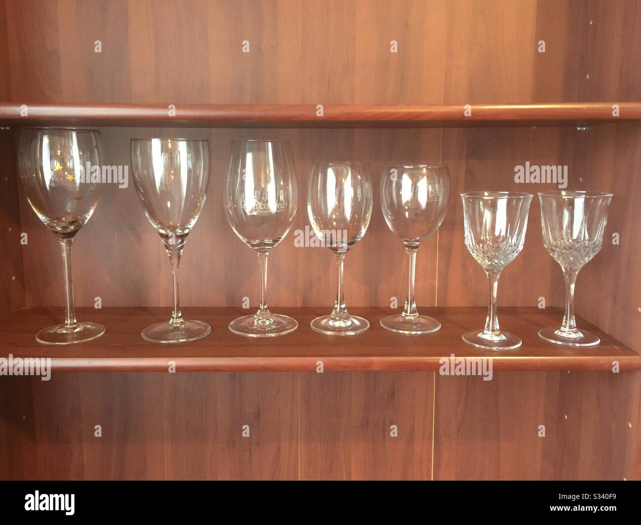 A selection of drinking glasses in colour Stock Photo