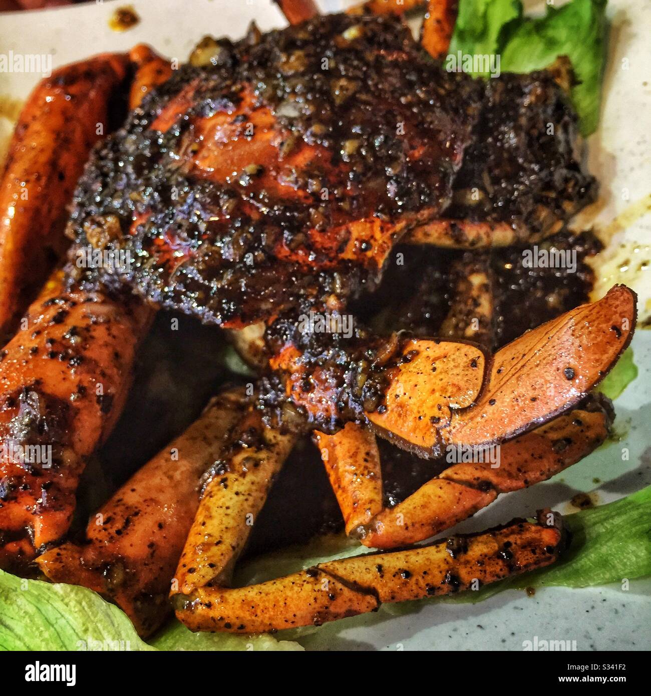 Black pepper crab in a street restaurant in Jalan Alor, a hawker food