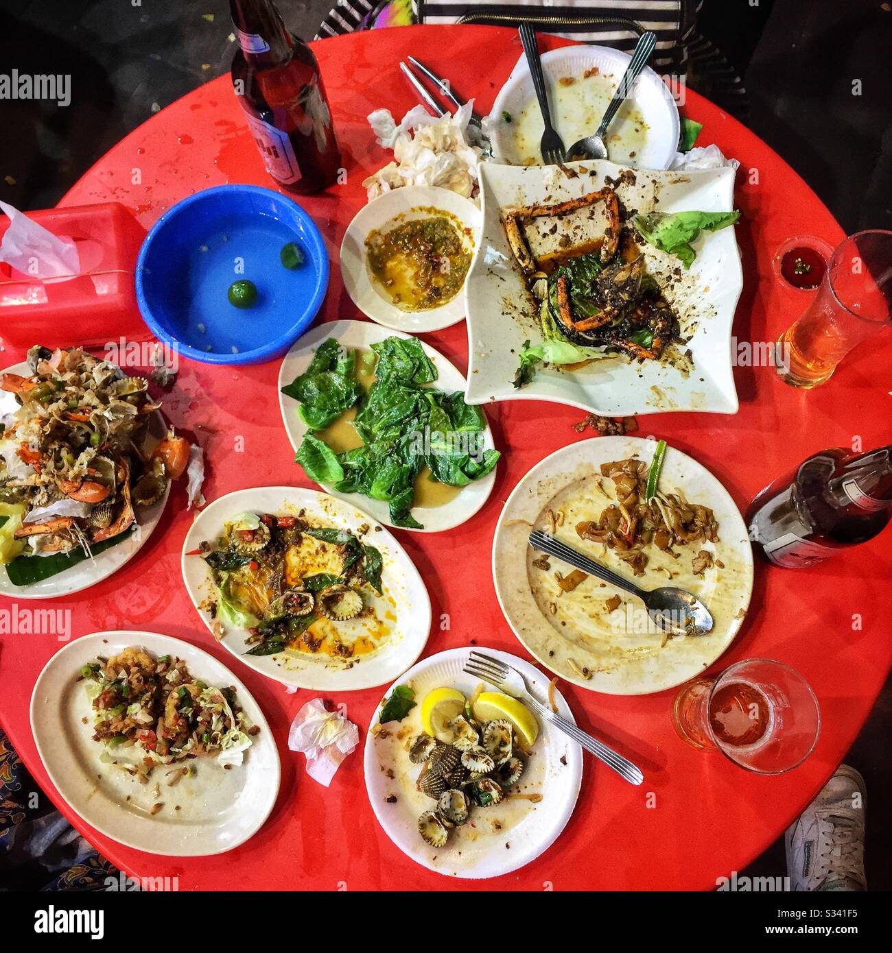 Aftermath of a meal at a street restaurant in Jalan Alor, a hawker food market in Bukit Bintang, Kuala Lumpur, Malaysia - Smartphone Captured Stock Image