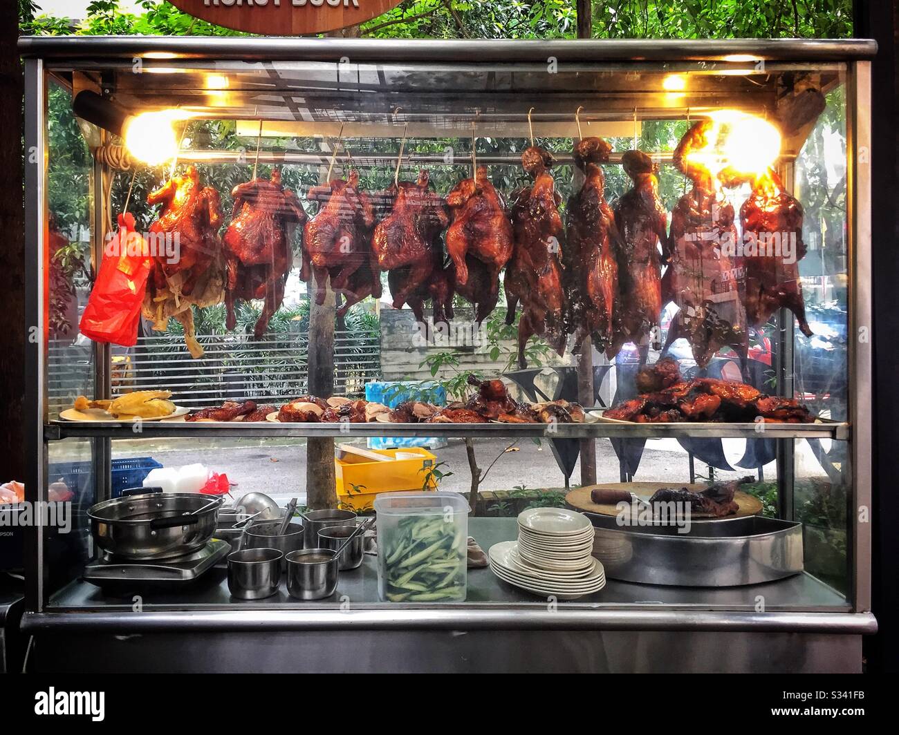 A food stall sells siu mei style roasted chicken and goose, Kuala Lumpur, Malaysia Stock Photo