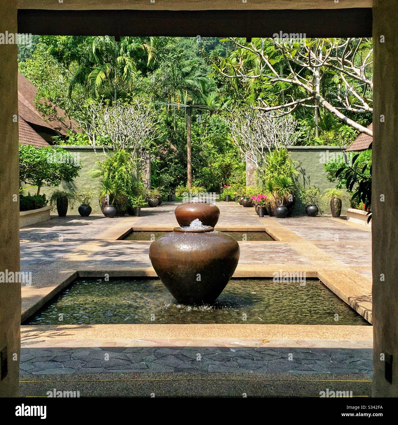 A courtyard at The Banjaran Hotsprings Retreat, a luxury resort near ...