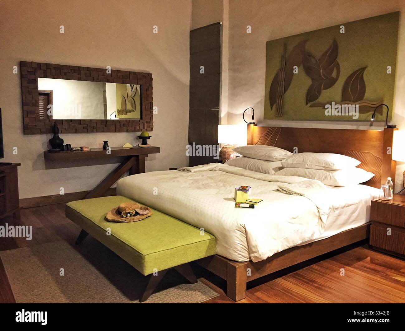 The bedroom of a Garden Villa at The Banjaran Hotsprings Retreat near Ipoh, Malaysia - Smartphone Captured Stock Image