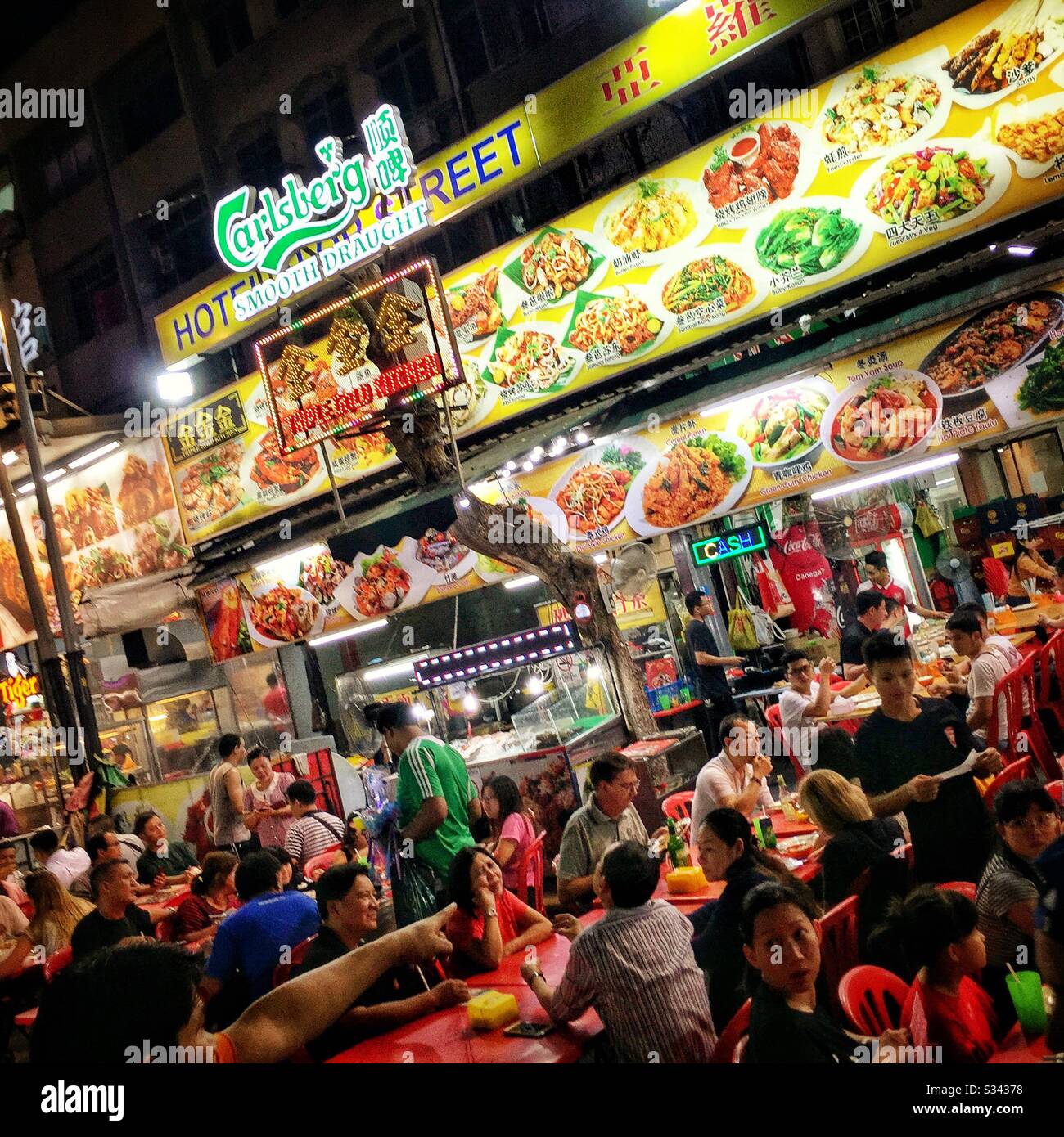 Outdoor restaurants in Jalan Alor, a hawker food market in Bukit Bintang, Kuala Lumpur, Malaysia - Smartphone Captured Stock Image