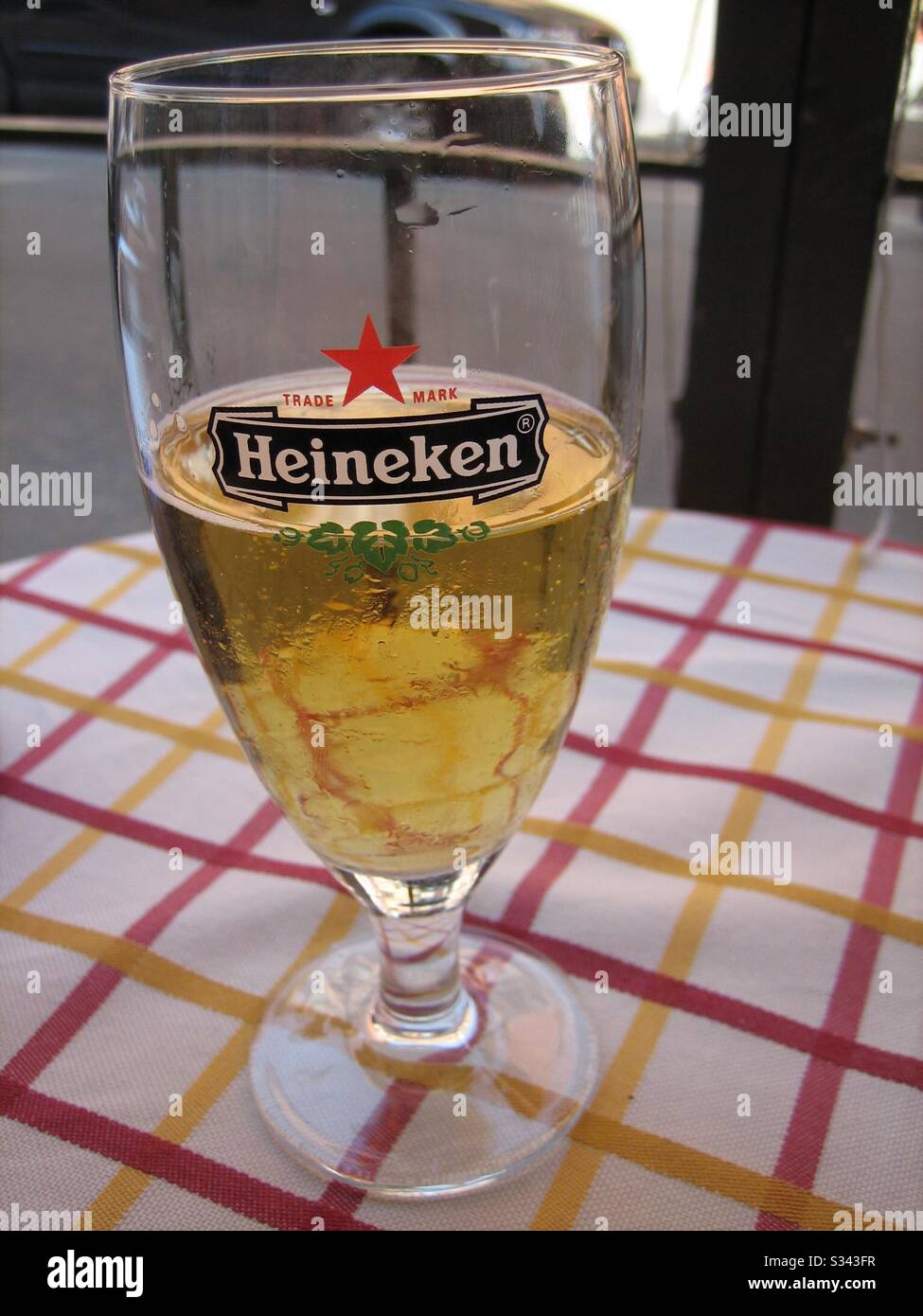 Half drunk glass of lager - Smartphone Captured Stock Image