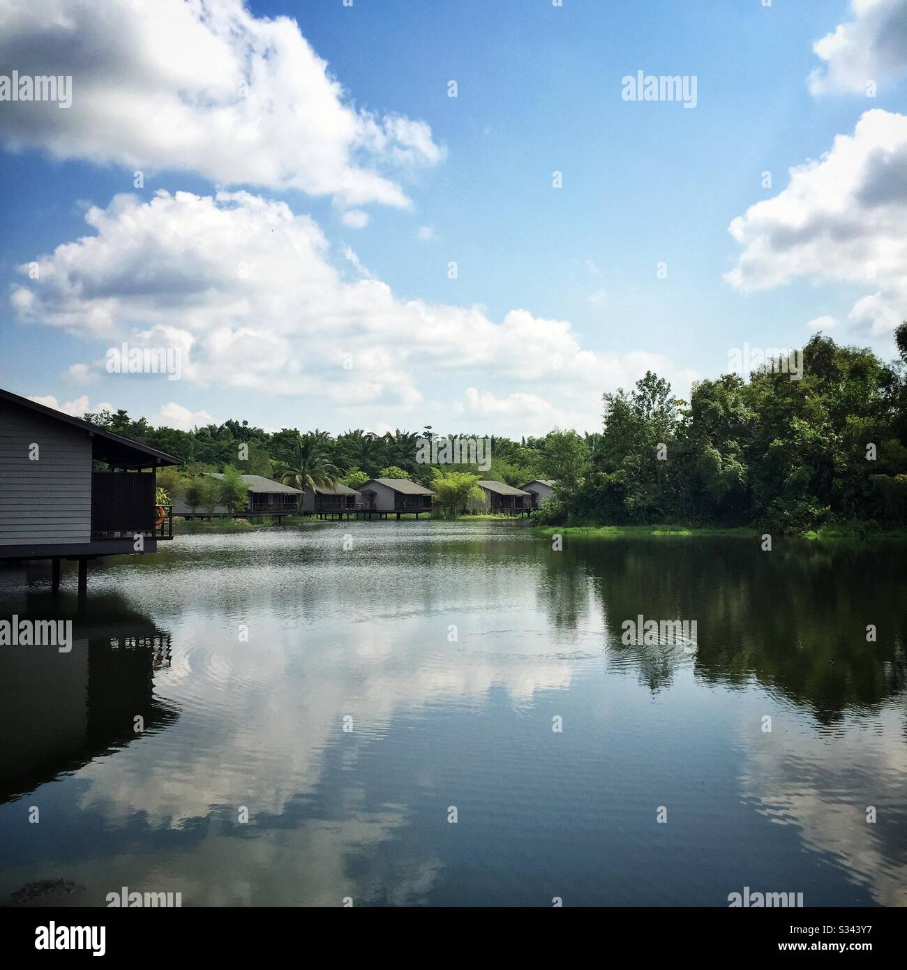 Jala Villas, built on stilts in the shallows of Mangala Lake, Mangala Resort and Spa, Gambang, Kuantan, Pahang, Malaysia - Smartphone Captured Stock Image