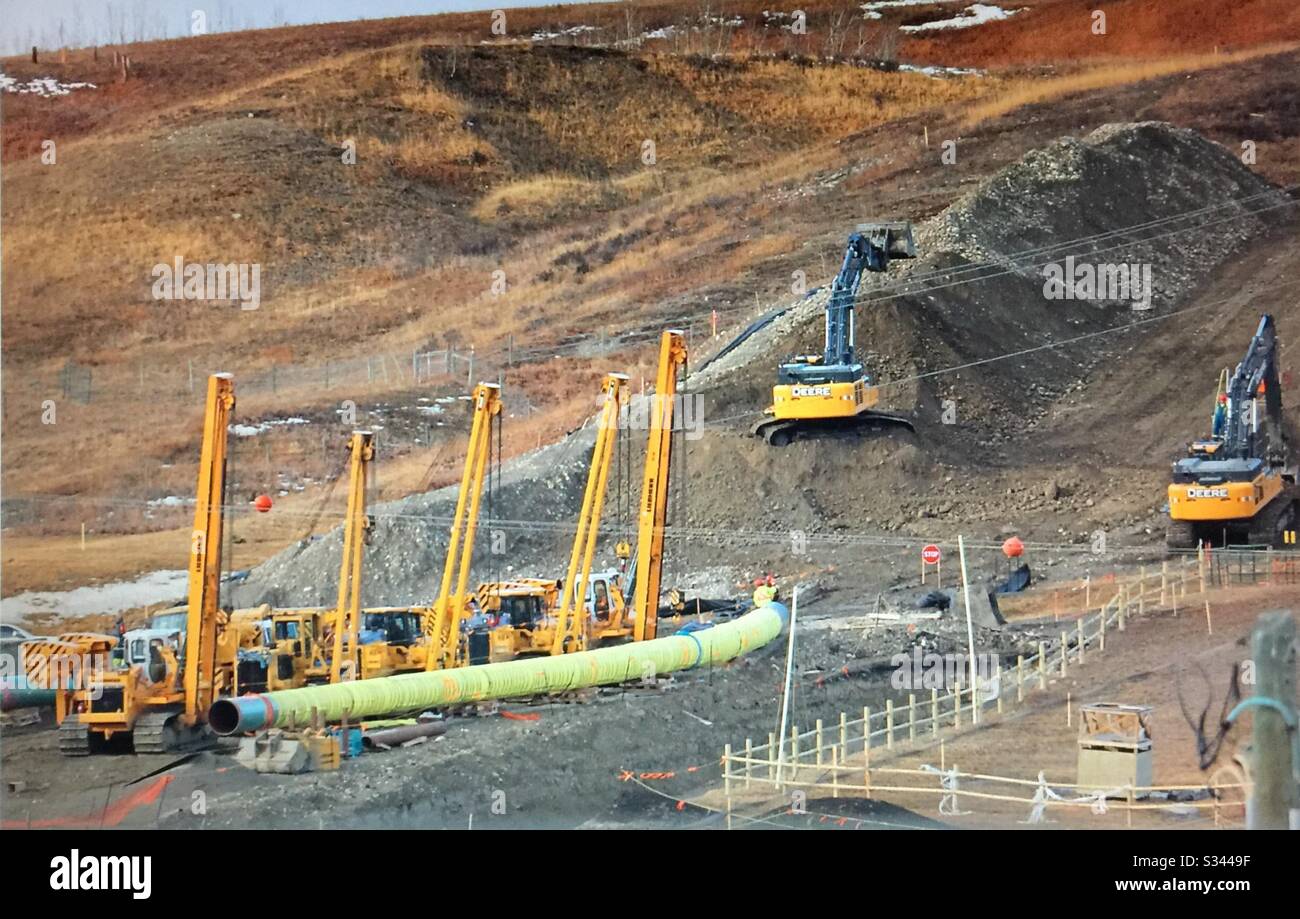 Gas pipeline, construction, near Cochrane, Alberta, Canada. Stock Photo