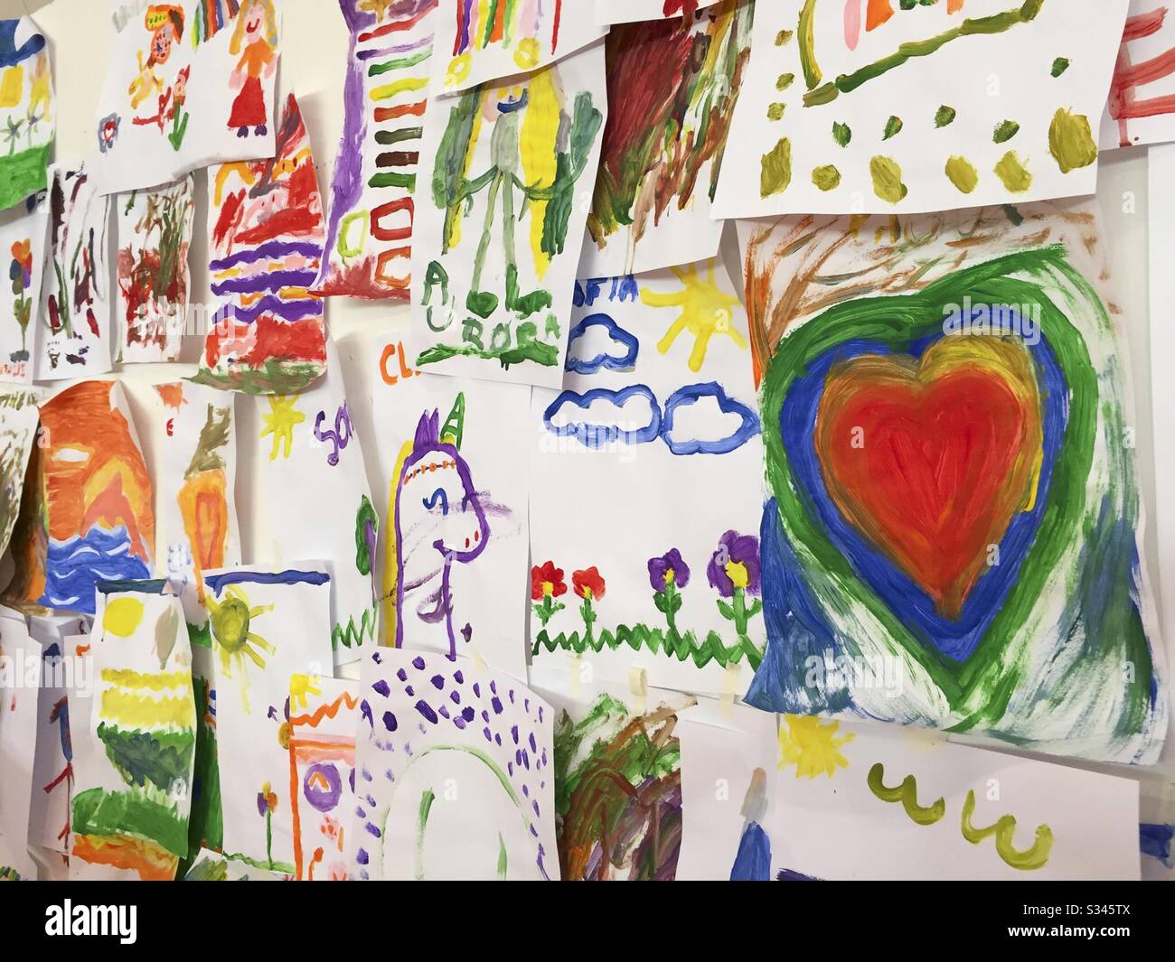 Colorful Children Paintings on Wall Stock Photo - Alamy