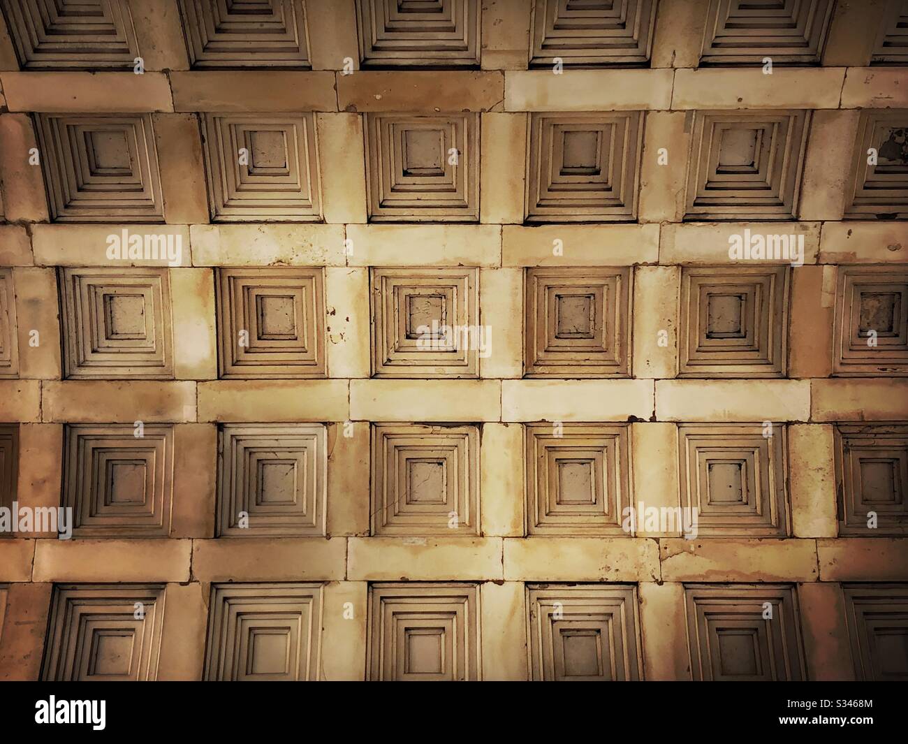 A low angle shot, looking straight up at the coffered ceiling of Wellington Arch, London. Architectural details - Smartphone Captured Stock Image
