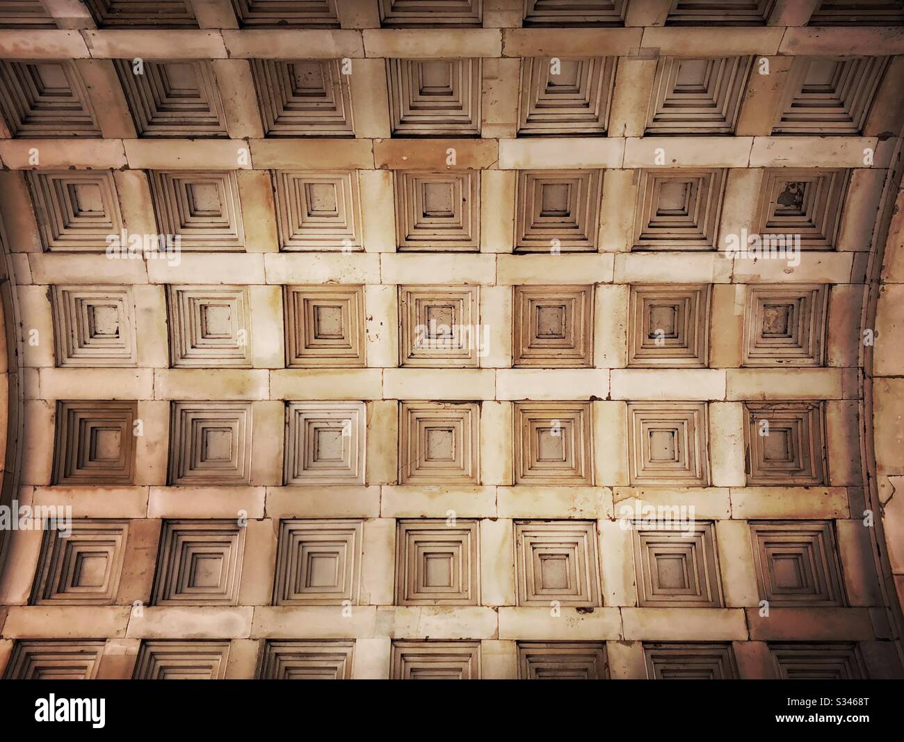 A worm’s eye view of the coffered ceiling under Wellington Arch, London. Geometric architectural details - Smartphone Captured Stock Image