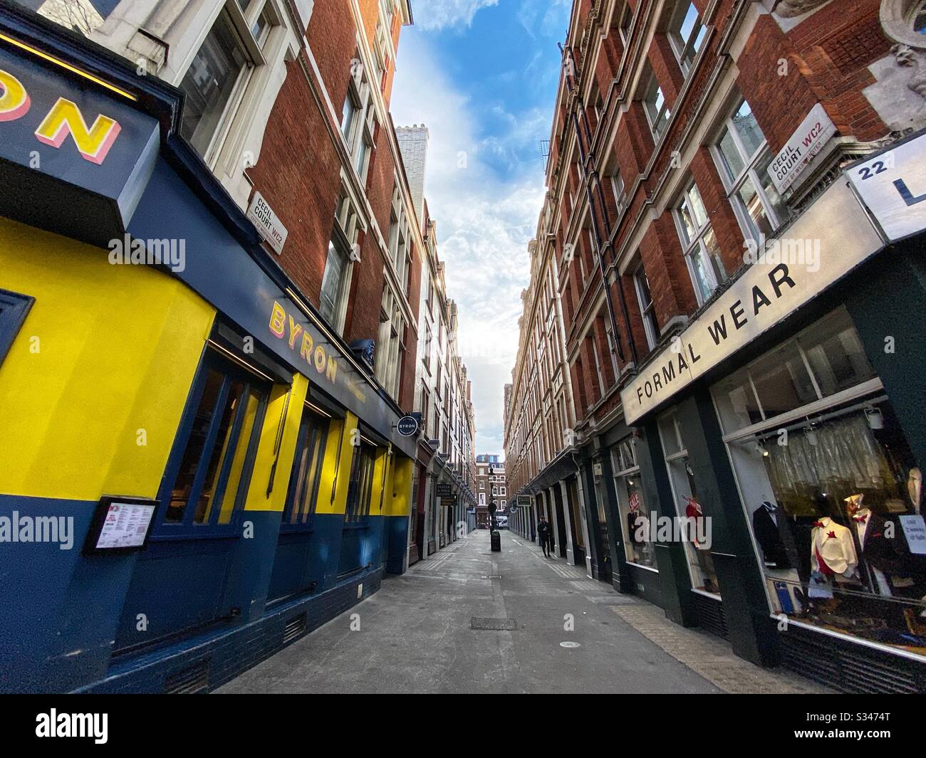 Cecil Court in London’s west end is seen during rush hour amidst the COVID-19 outbreak on March 17 in London, England - Smartphone Captured Stock Image