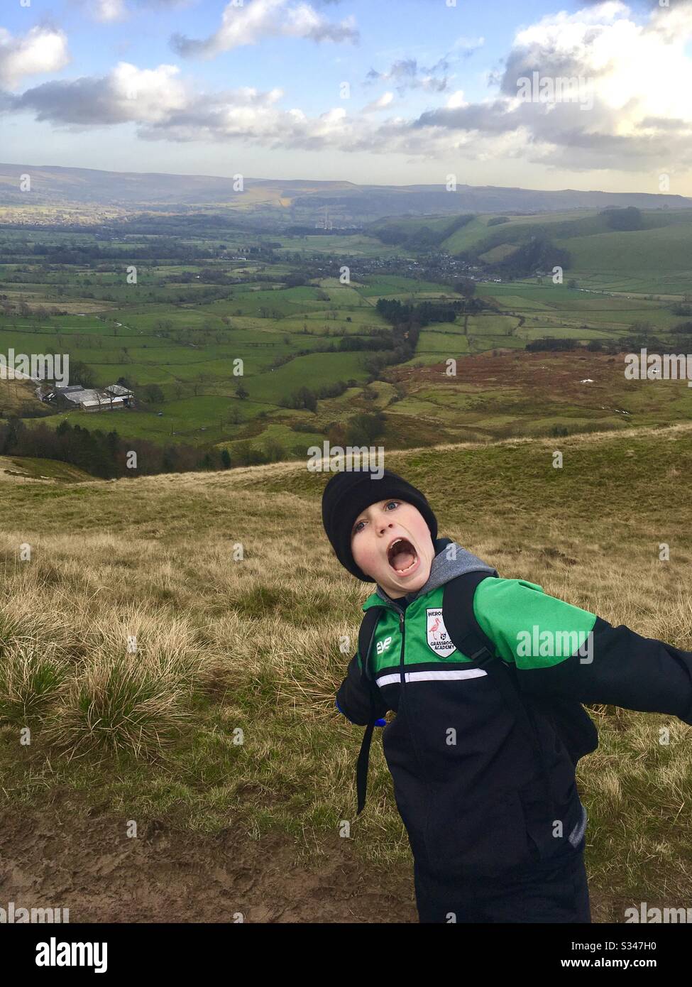 Shouting boy in countryside Stock Photo