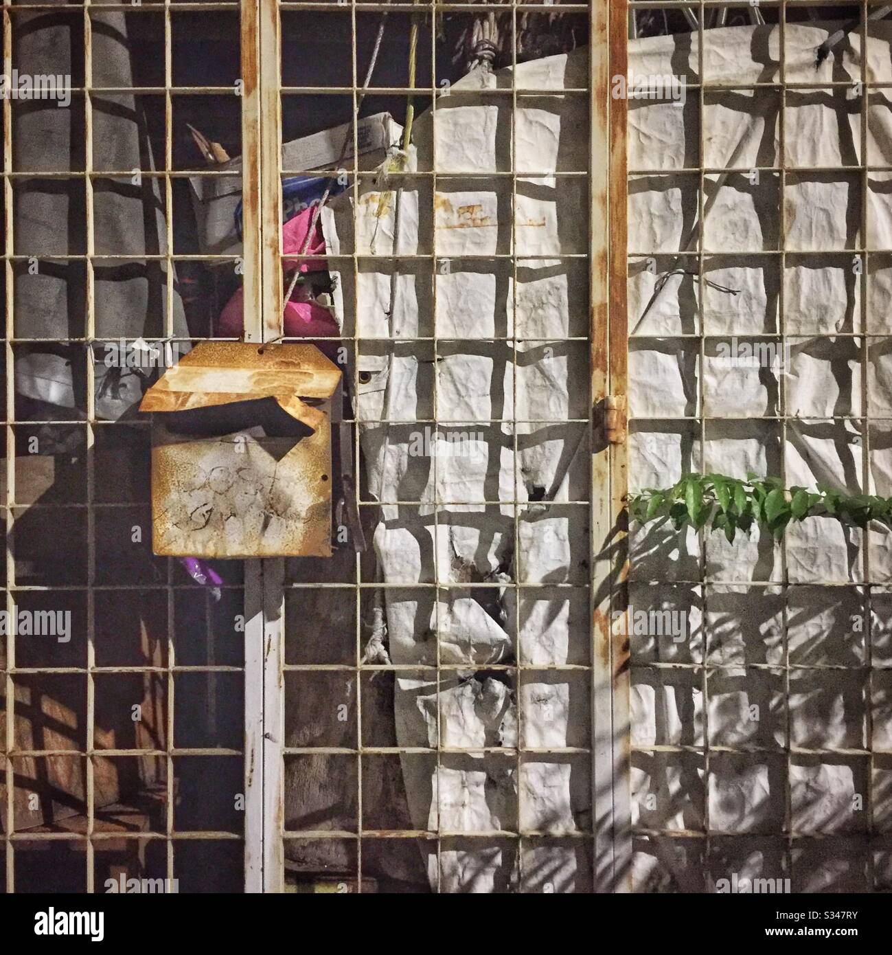 The mailbox and security mesh of a house in the Old Town of George Town, Penang, Malaysia - Smartphone Captured Stock Image
