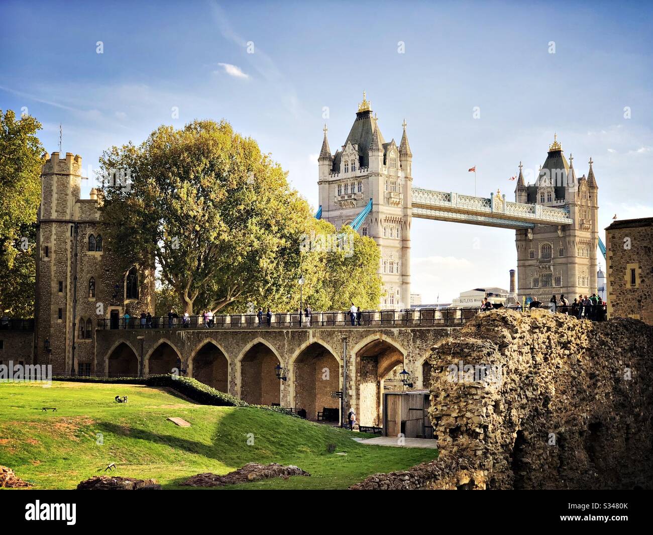 A scenic view of Tower Bridge from with the Tower of London. Medieval castle and fortress complex within Tower Hamlets Stock Photo