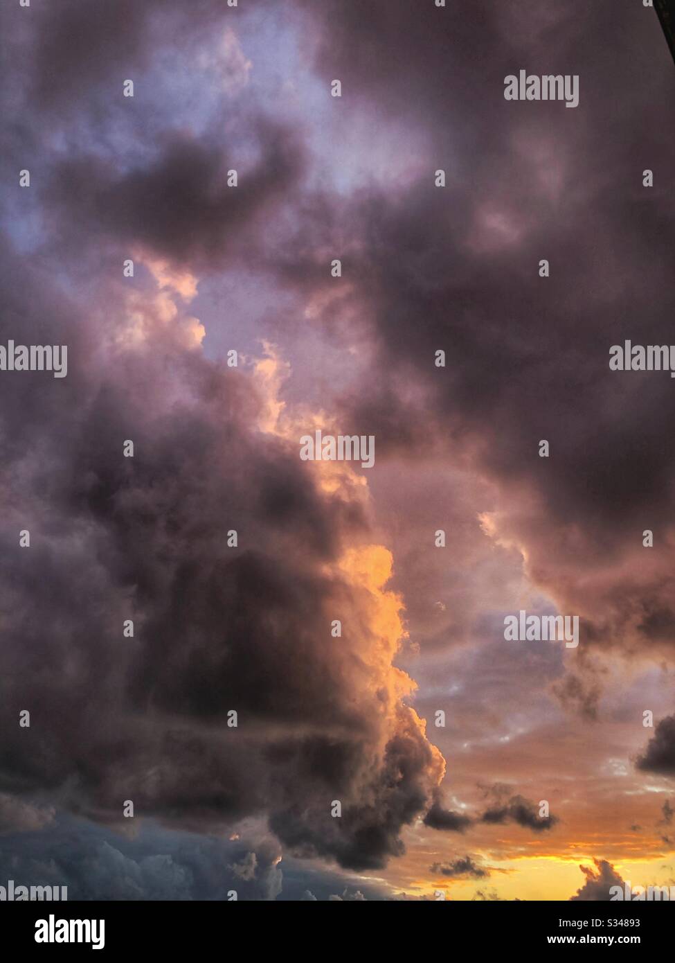 Clouds with charming sunset Stock Photo