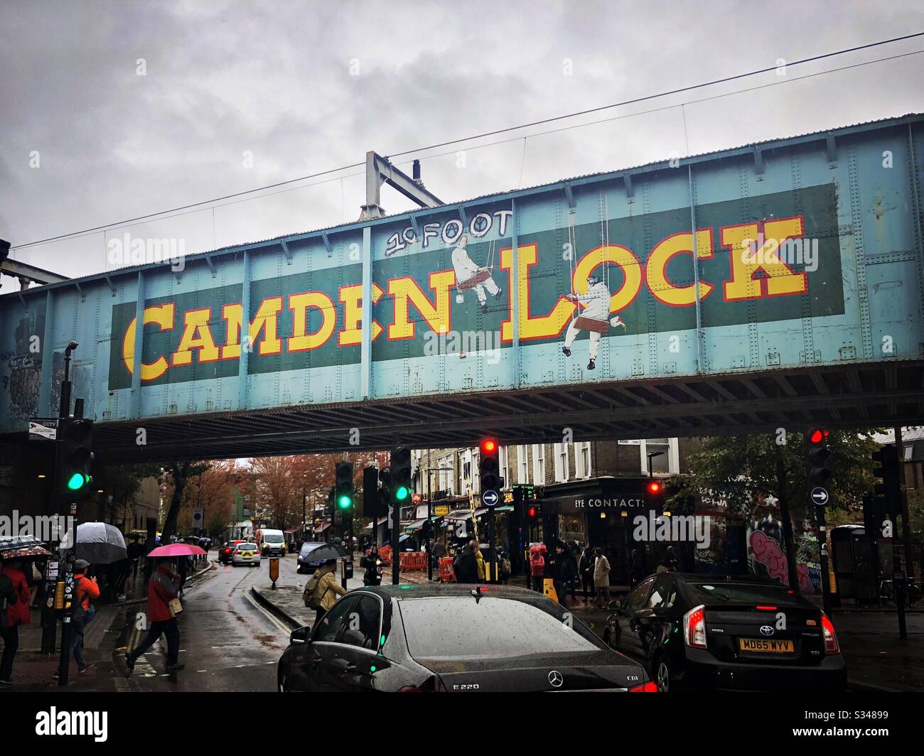 Camden Lock bridge in Camden Town, London. Street photography on a rainy day. - Smartphone Captured Stock Image