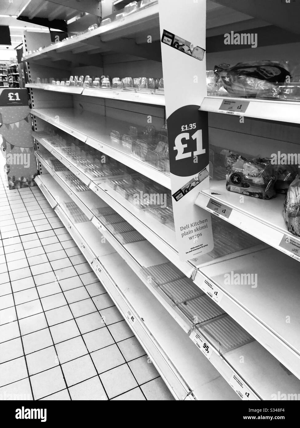 Empty shop shelves Stock Photo